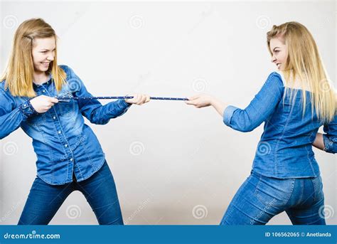 2 girls pulling a rope|272 Girls Pulling Rope Stock Photos